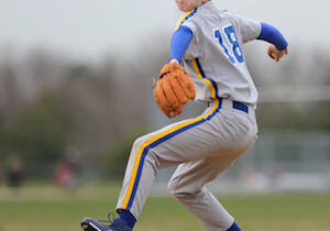 Grant Lewis (#18) pitching in his first High School baseball game for the Sandburg Eagles against the Marist Red Hawks at Marist High School in Chicago, Illinois on March 24, 2010